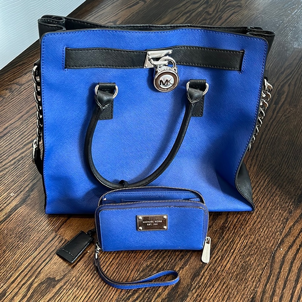 Michael Kors  blue handbag with matching Wallet. Very good condition.